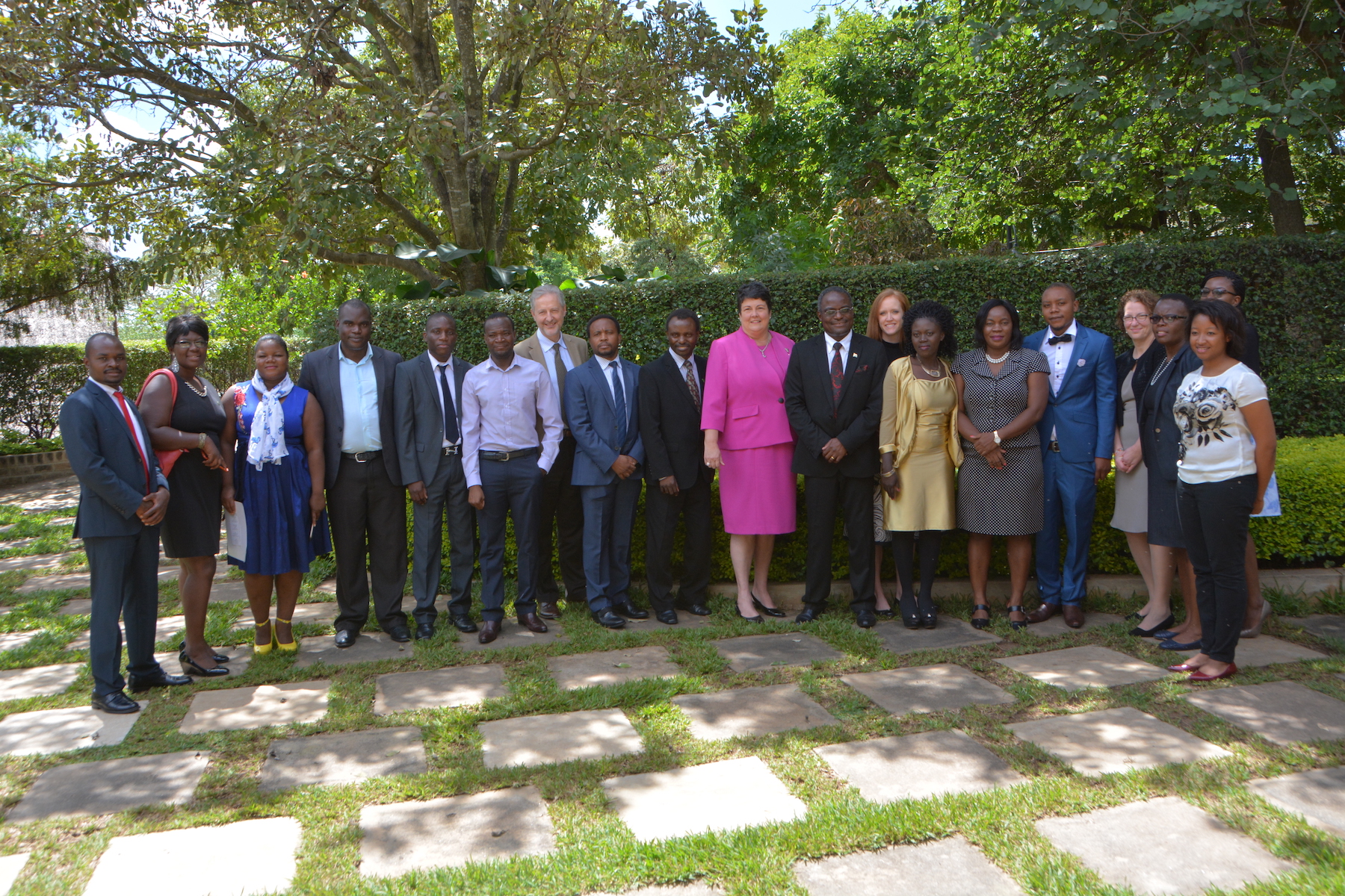 US Ambassador with graduates, teachers, and personnel from Tufts, LUANAR, and Malawi College of Medicine.